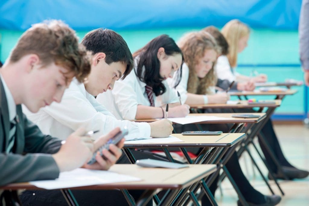 focused students taking exam